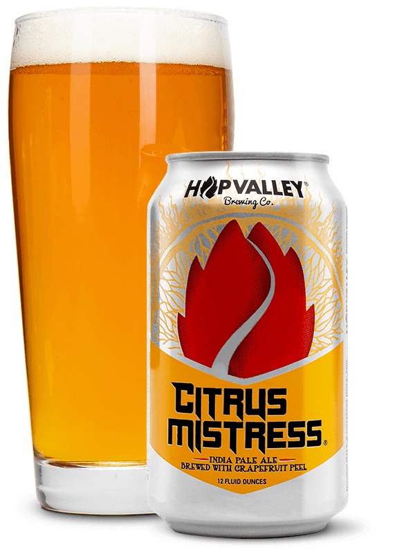 Citrus Mistress IPA glass and can beer